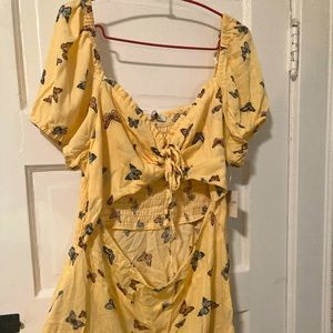 Women’s yellow butterfly dress